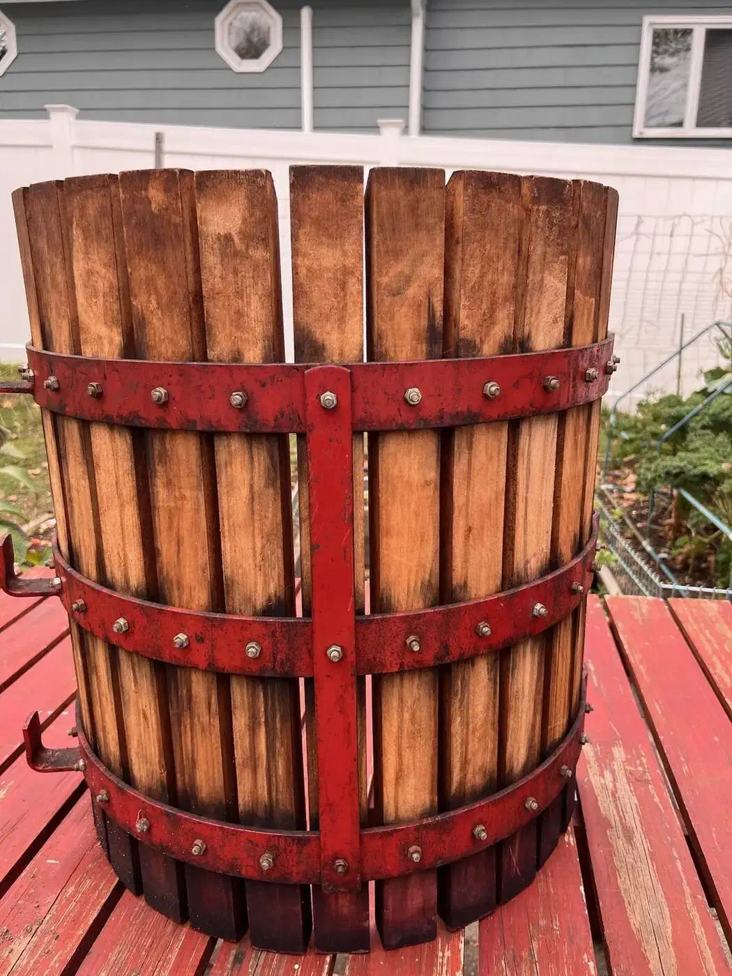 The side slats before cleanup, showing the original weathered wood.
